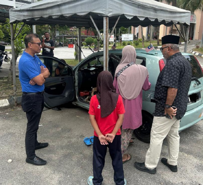 Family of four, with two schoolchildren living in car at KL mosque compound for last two years
