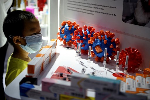 China to start opening vaccination programme to general public