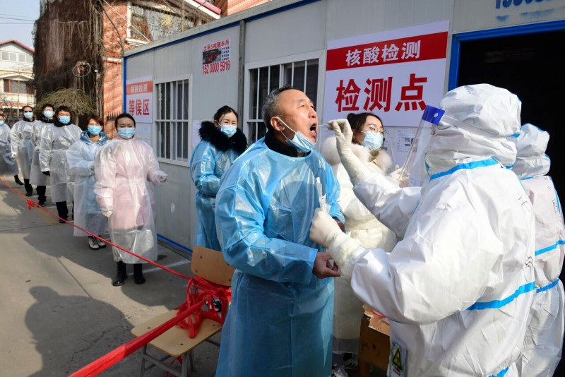 China reports nearly 13,000 Covid-19 deaths over last week