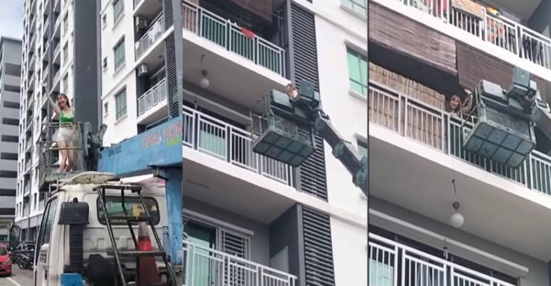 Woman uses crane to get to her apartment after door lock malfunctions 