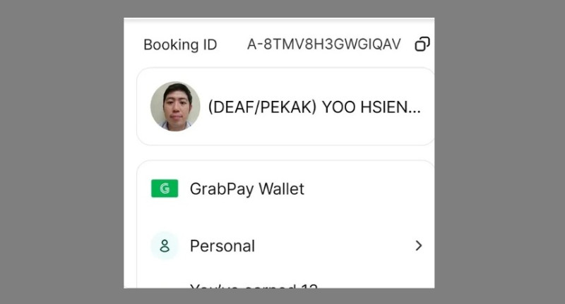 Netizens praise deaf Grab driver who returned hand phone left behind by passenger