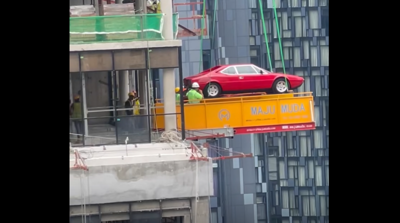 Video of crane hoisting Ferrari into building near KLCC goes viral