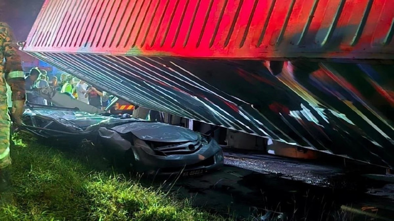 Father, daughter killed after container crushes car in Sabah