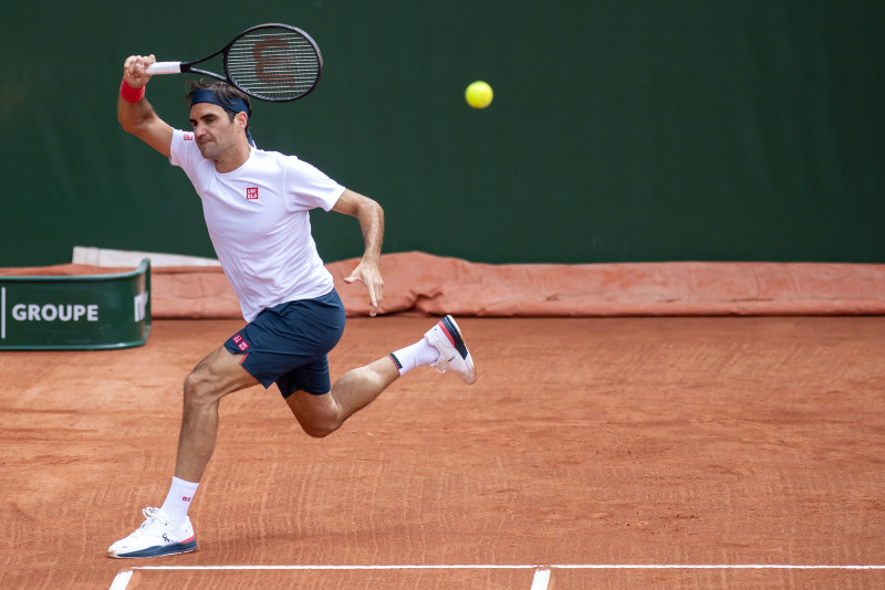  'On this train until Wimbledon,' says Federer as Swiss returns