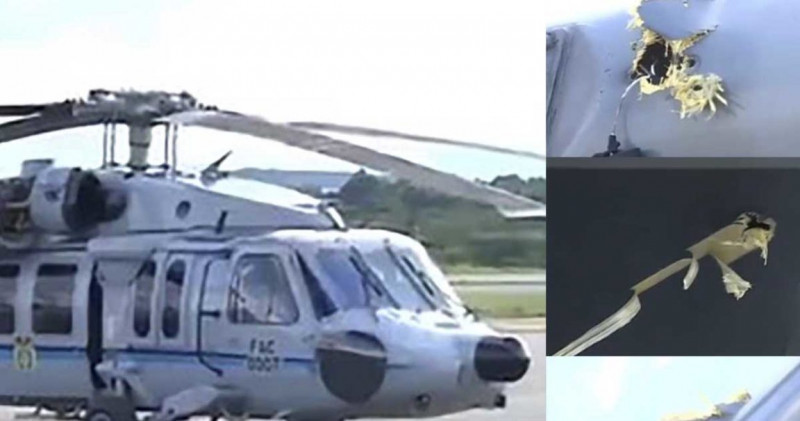 Copter hit by gunfire in first attack on Colombian president in 20 years