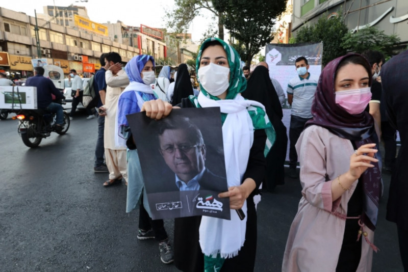 Presidential polls open in Iran, ultraconservative tipped to win