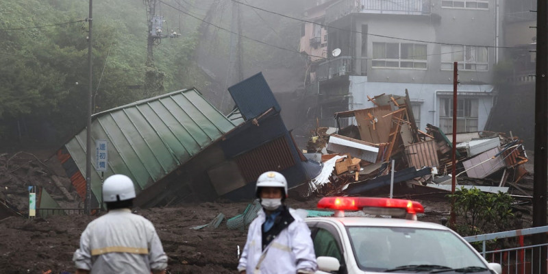 Rescuers search for survivors in landslide-hit Japan town