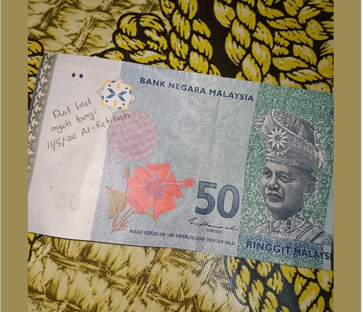 Man seeks original owner of RM50 with message ‘Last money from dad’ 