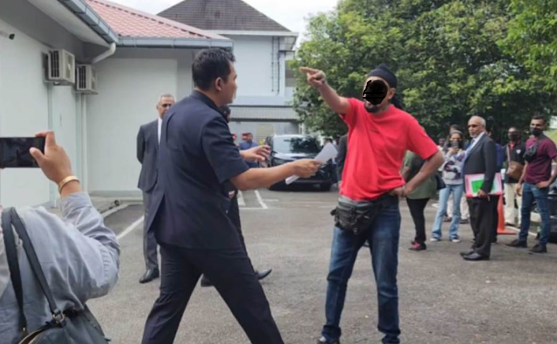  Murder victim's relative confronts suspect as he leaves court