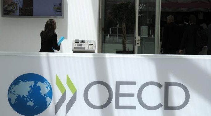 OECD sees higher world GDP growth but fears ‘headwinds’