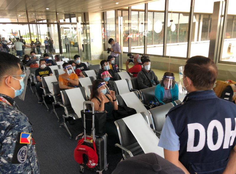 Philippines bans arrivals from 20 countries over new virus strain