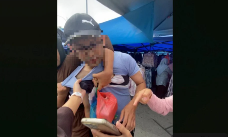 Civil servant arrested for taking video of woman, pornographic material found on mobile phone
