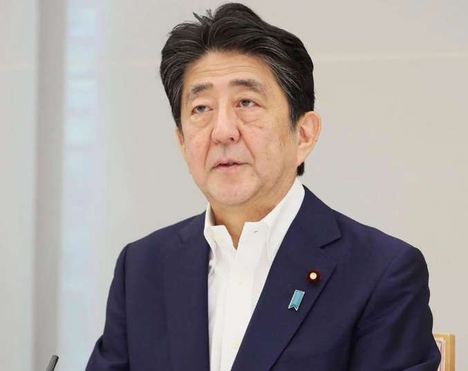 Ex-Japan PM Abe questioned over dinner functions spending