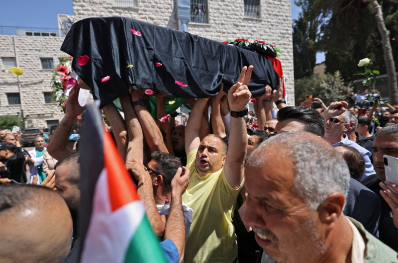Palestinians honour slain journalist, reject joint probe