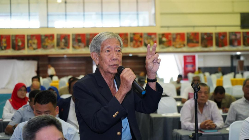 Retired naturalised athlete accused of cheating Kok Chi, his disabled daughter