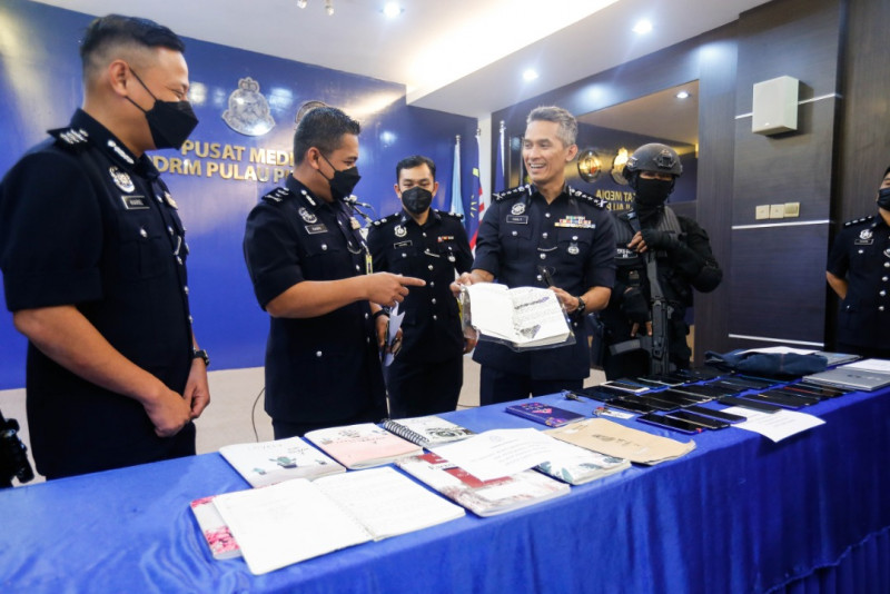 Penang cops bust fake loan scam worth over RM1 mil