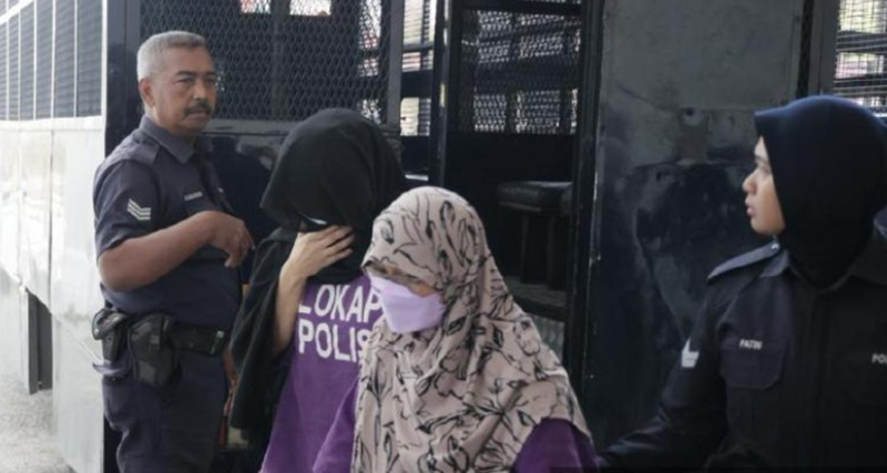 Teacher believed to have crashed into two students in school grounds taken to court for remand 