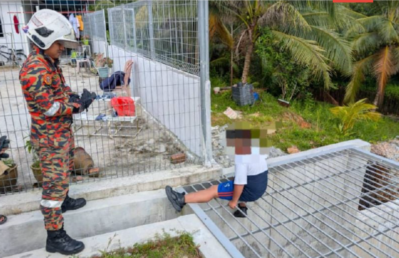 Firemen help free boy whose foot was stuck in metal grate