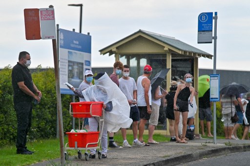 Australian virus cluster triggers travel clampdown