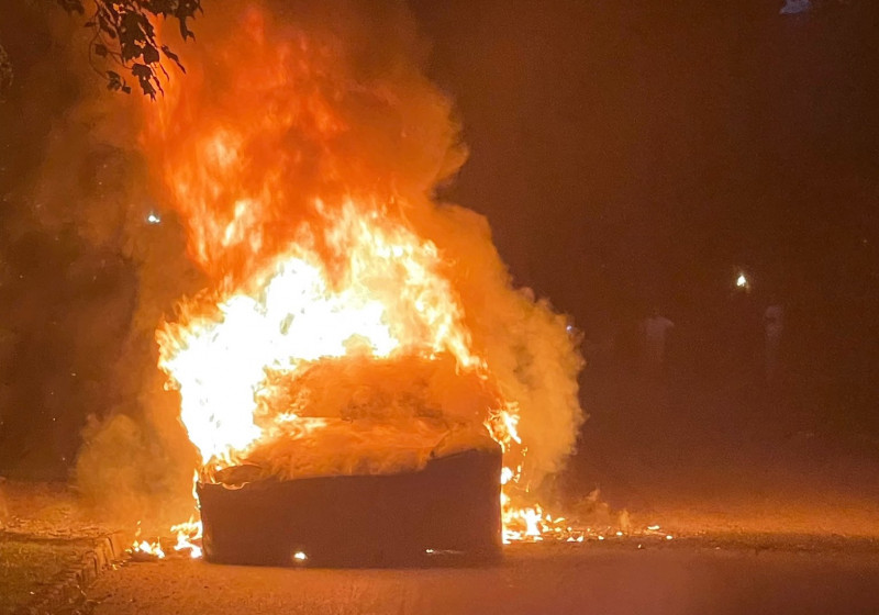 Regulators probe into Tesla fire that temporarily traps man inside