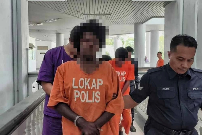 Man in women’s attire remanded over alleged cleaver attack in Melaka