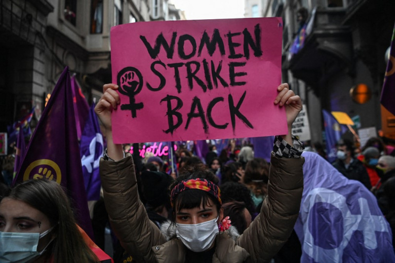 Thousands defy virus restrictions for Women’s Day rallies