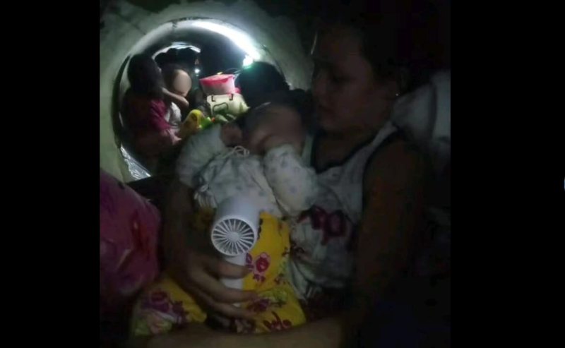 14 families, including 3-month-baby, shelter inside drainage canal as Typhoon Kalmaegi hits Philippines