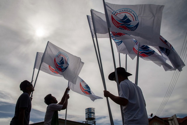 GE15: Labuan’s campaign war finally heats up as parties hoist flags