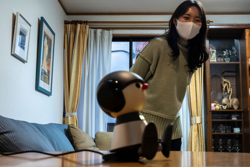 Hi, Robot: Japan's android pets ease virus isolation